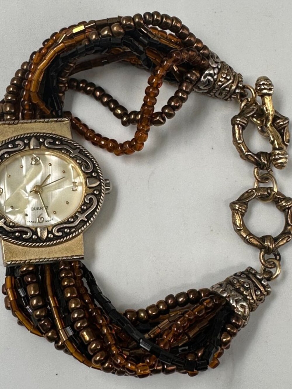 Womens Watch Gold Tone Brown Beaded Multi Chain Toggle Clasp New Battery